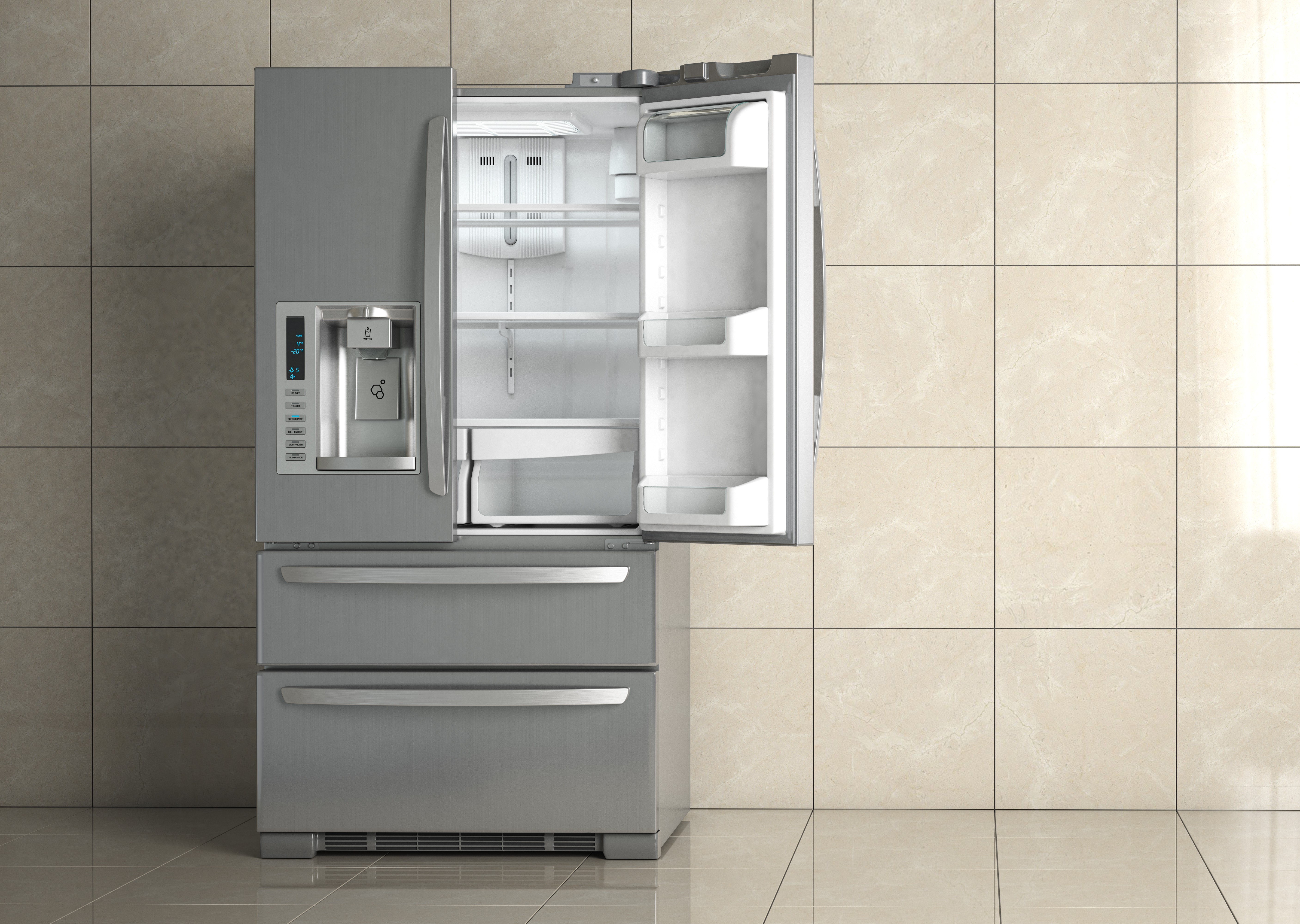 Modern energy-efficient refrigerator open in a tiled kitchen, showcasing its compartments.