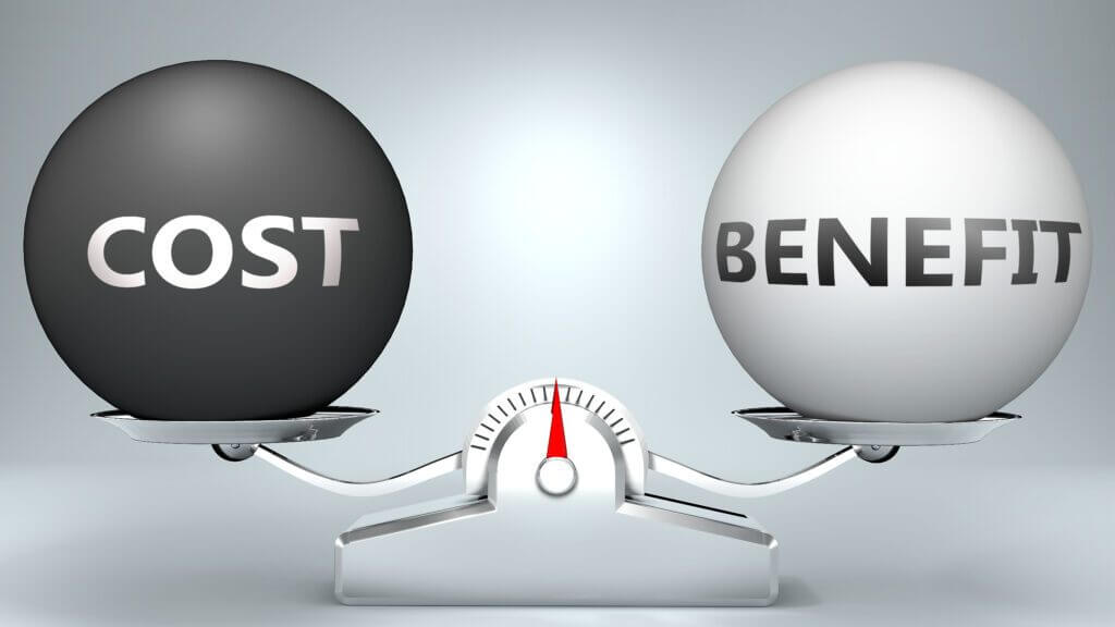 A scale balancing two spheres labeled "COST" and "BENEFIT"
