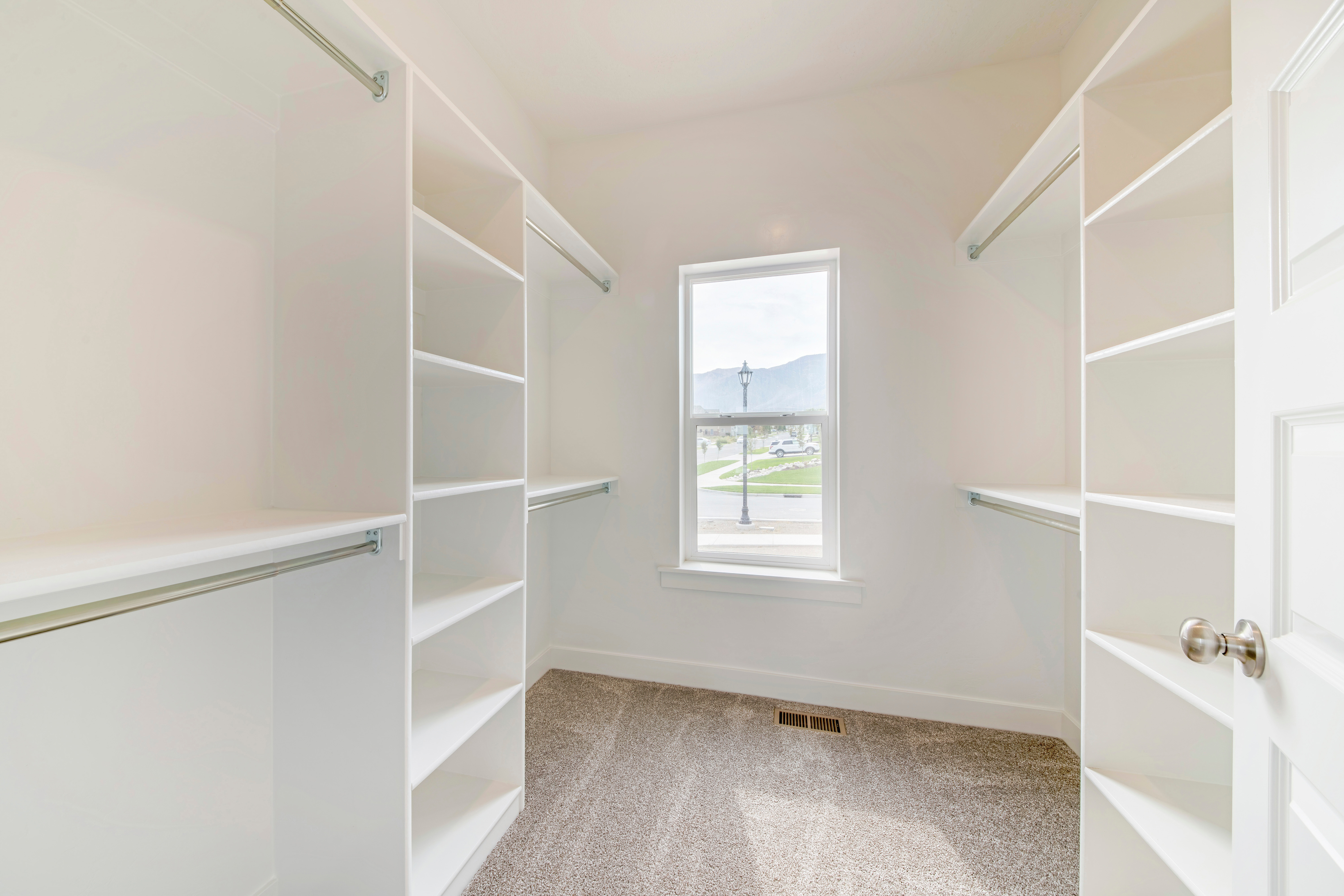 A single hung window illuminates a neatly organized closet, blending simplicity and efficiency.
Title: Single Hung Windows: Enhancing Light and Space in Modern Homes