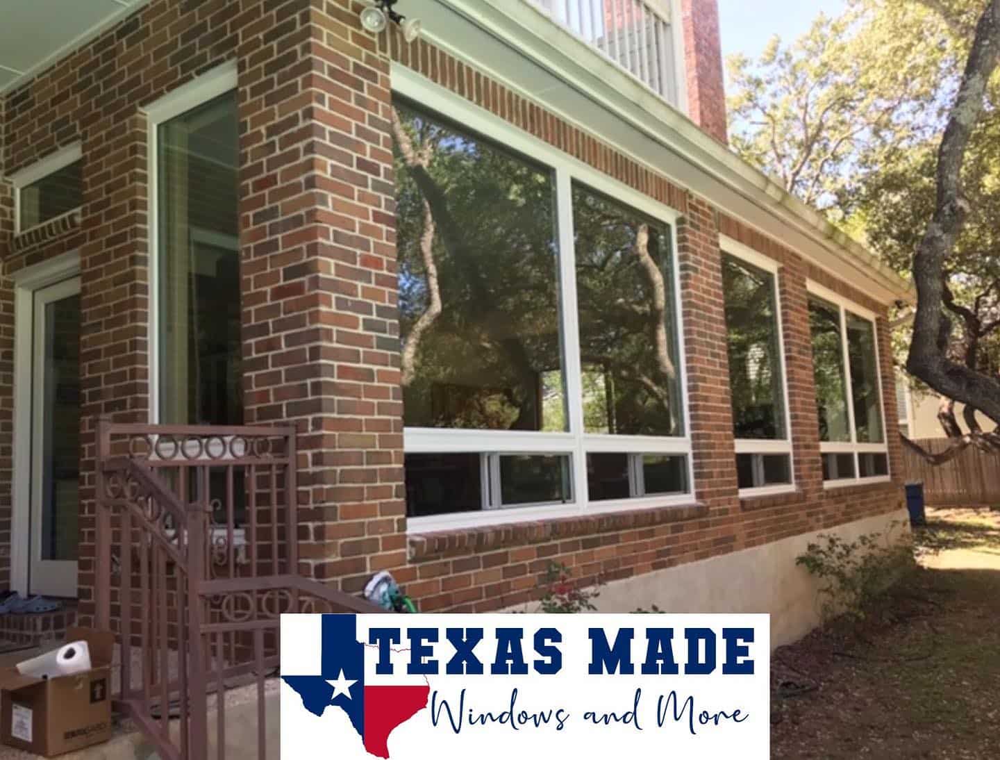 Renovated brick home in San Antonio with new, clear windows enhancing natural light and curb appeal.
