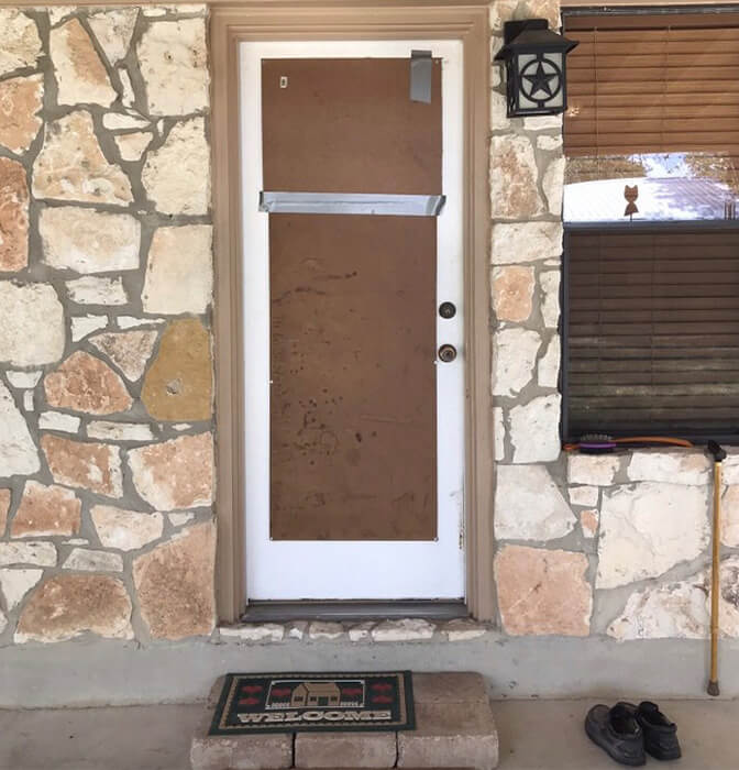Damaged front door in need of replacement