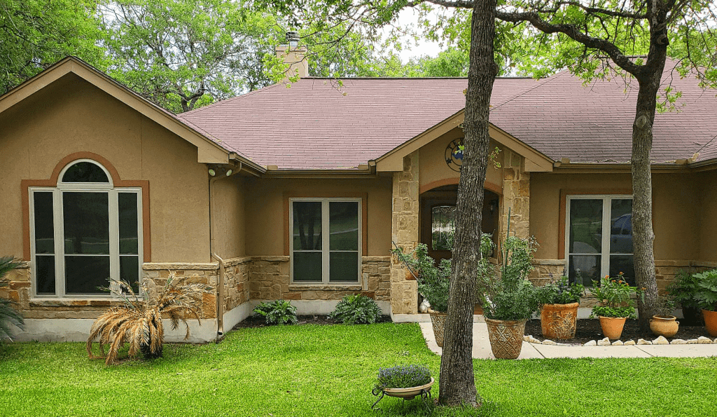 A single-story house showcasing newly replaced windows, part of our Window Installation Deals.