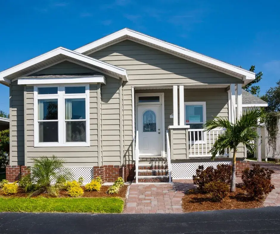 Exterior view of a modern house with new windows, illustrating the cost to replace windows for enhancing curb appeal.